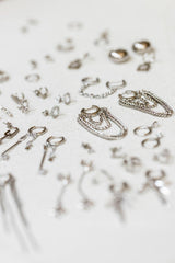 Pendientes cuatro pétalos plata