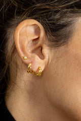 Pendiente flor brillante