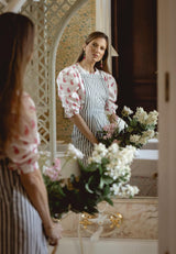 Camisa manga abullonada plumas rosa