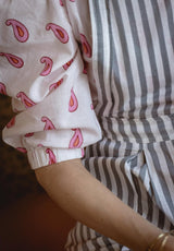 Camisa manga abullonada plumas rosa