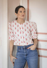 Camisa manga abullonada plumas rosa