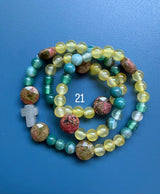 Rosario pulsera collar piedra niño