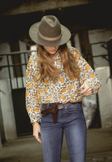 Camisa flores amarillas