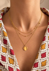 Colgante triple moneda