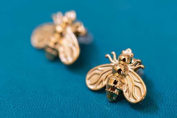 Pendientes mosca