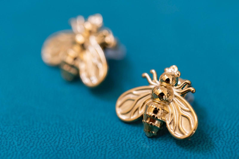 Pendientes mosca