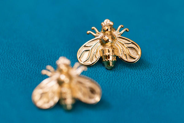 Pendientes mosca