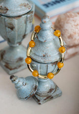 Collar bolas naranjas