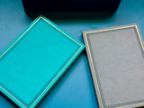 Cuaderno antiguo gris