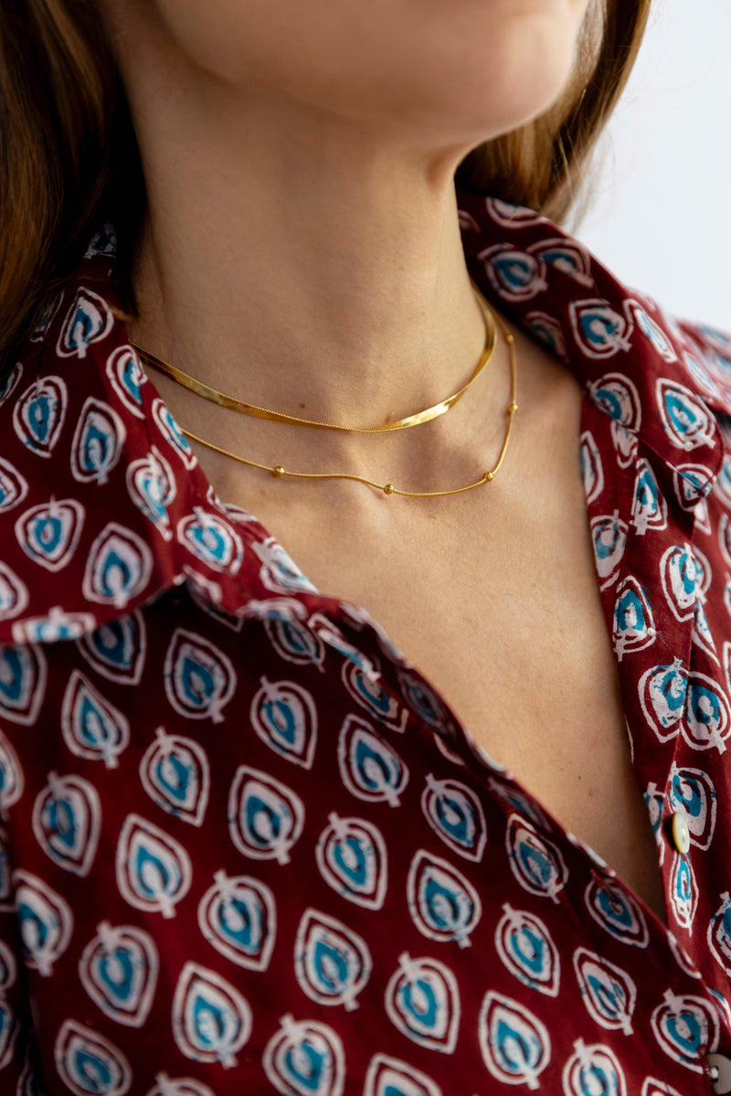 Cadena cuatro bolitas