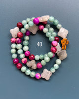 Rosario pulsera collar piedra niño