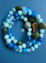Rosario pulsera collar piedra niño