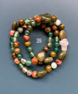 Rosario pulsera collar piedra niño