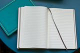 Cuaderno antiguo gris