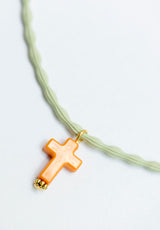 Colgante elástico cruz
