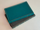 Cuaderno antiguo gris