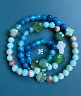 Rosario pulsera collar piedra niño