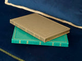 Cuaderno antiguo gris