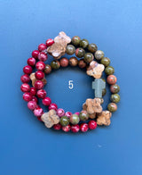 Rosario pulsera collar piedra niño