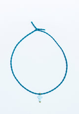 Colgante elástico cruz