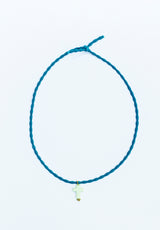 Colgante elástico cruz