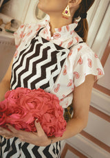 Bolso mano rosas fucsia