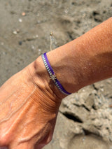 Pulsera tela estrella lila