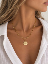 Colgante doble moneda