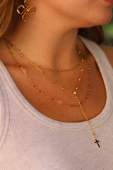 Colgante triple cadena cruz