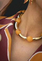 Collar bolas naranjas