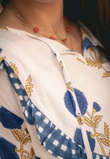Vestido blanco estampado flor azul