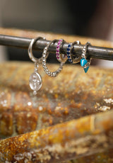 Aros brillantes rosa plata