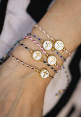 Pulsera cruz esmalte blanco