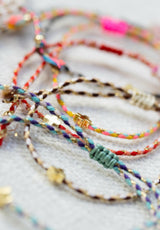 Pulsera cuerda cruz colores