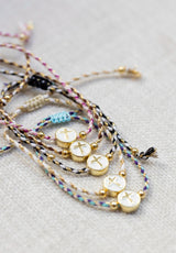 Pulsera cruz esmalte blanco