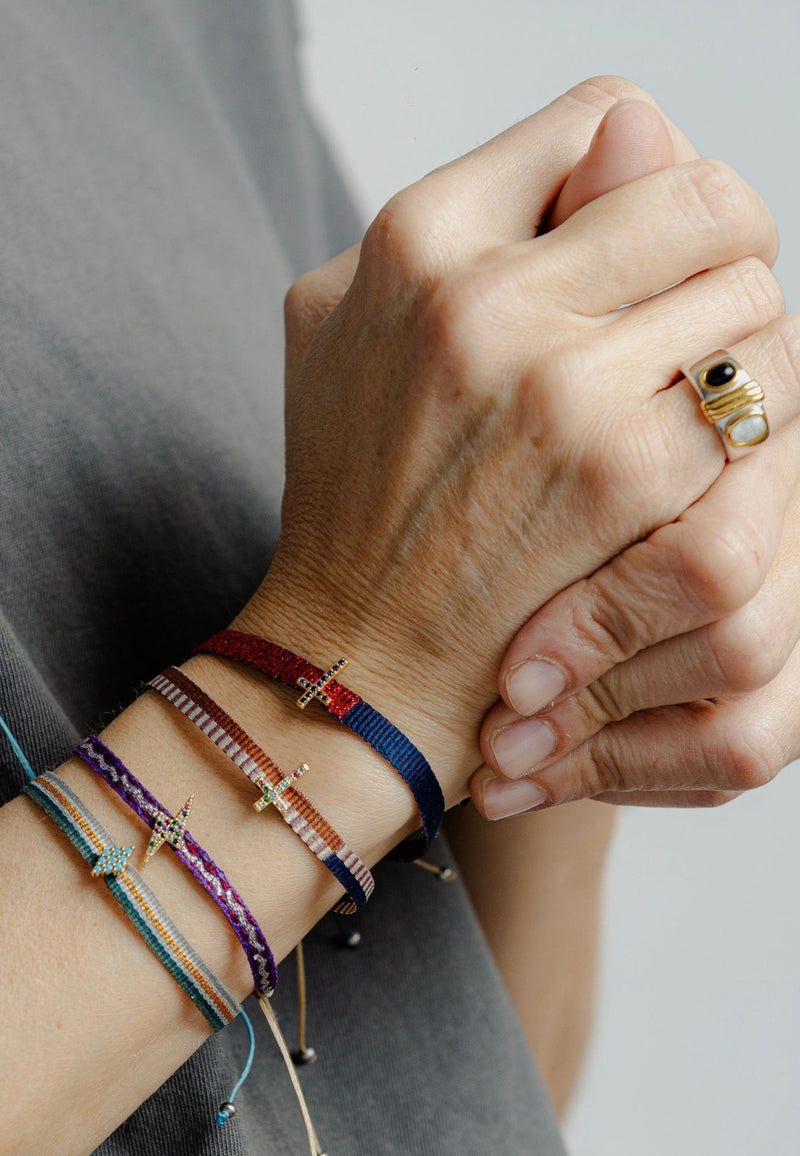 Pulsera tela cruz marrón